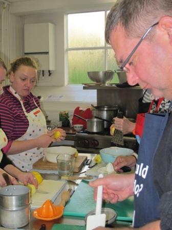 Making lemon curd on preserve course