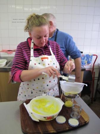 Sieving lemon curd on preserve course